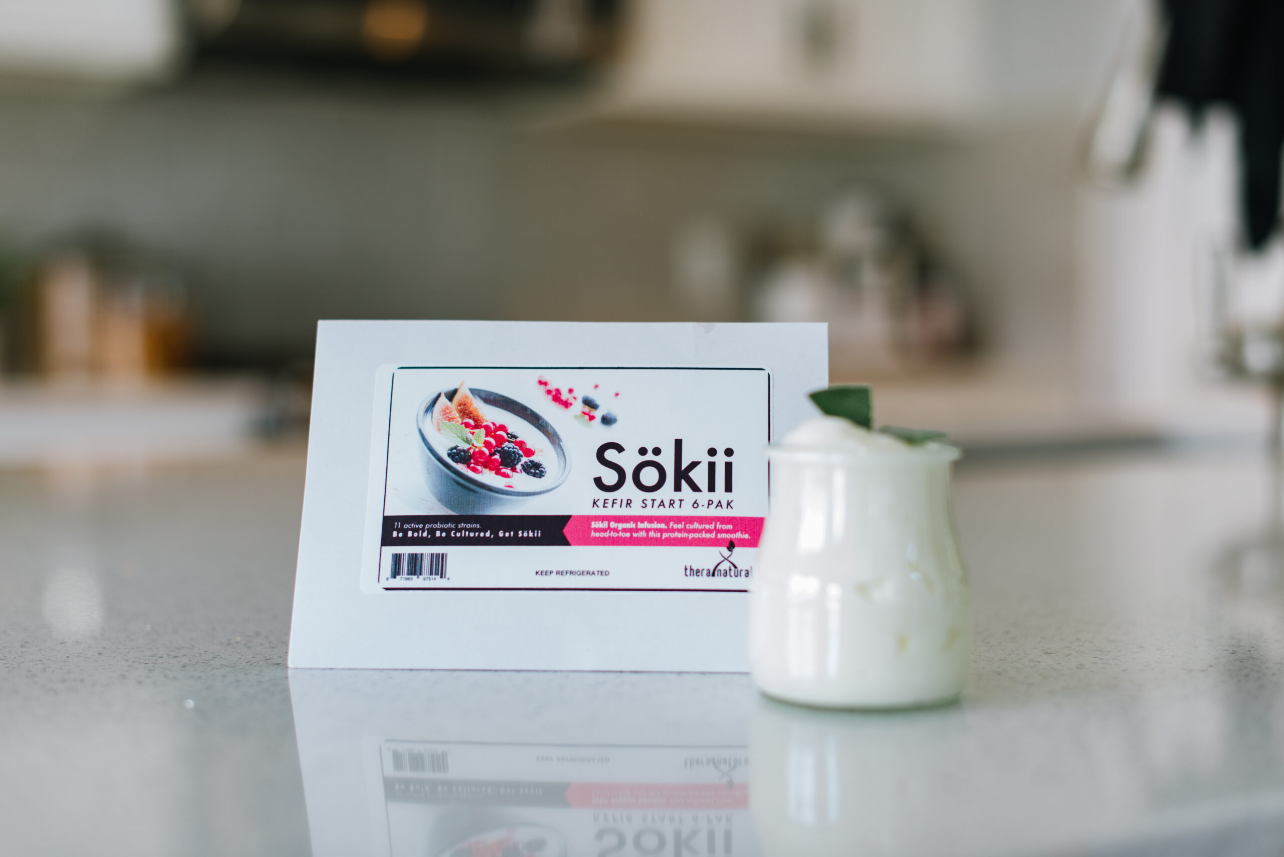 Soki Kefir packet and cup on countertop
