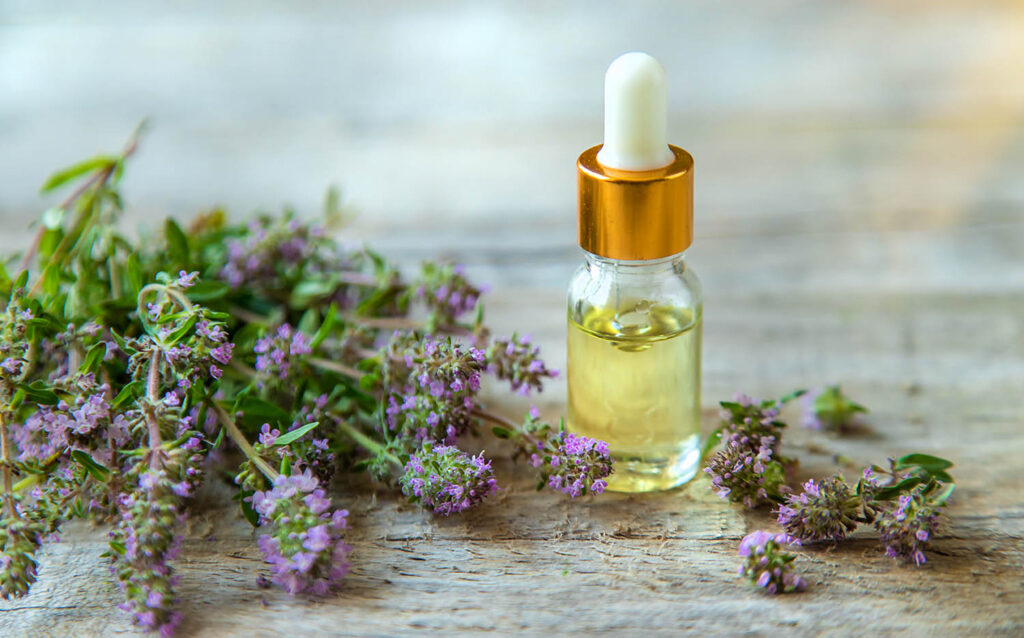 Essential Oil Bottle and Thyme